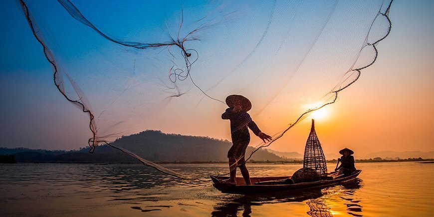 Fiskare i Mekongfloden i Vietnam
