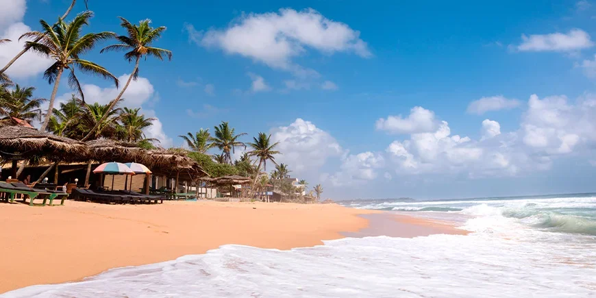 Strand vid Hikkaduwa på Sri Lanka