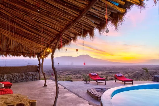 Solnedgång över Osiligilai Maasai Lodge